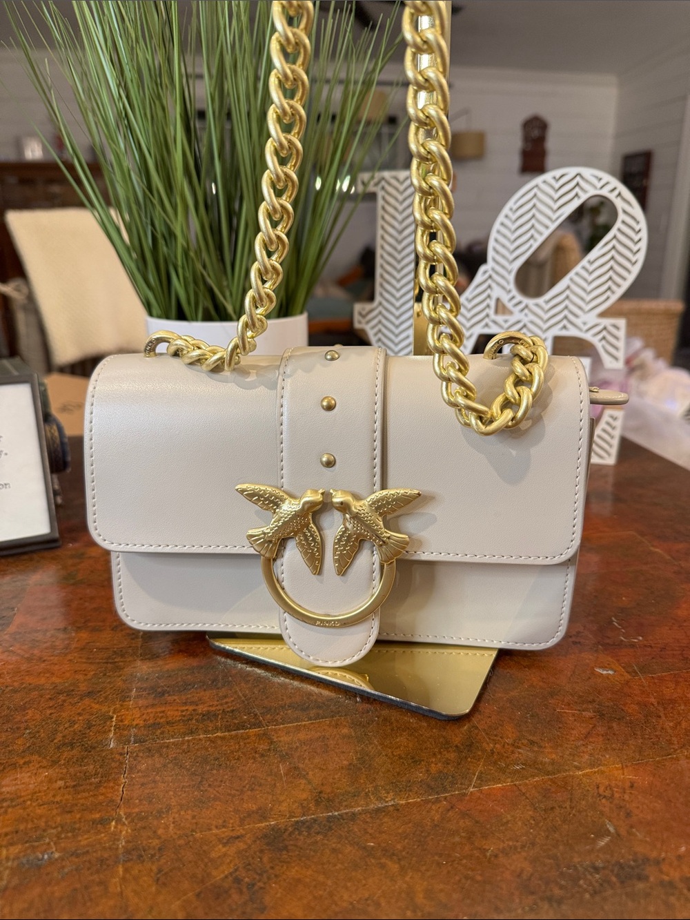 Pinko Cream Leather Crossbody with Gold Chain and Bird Ring